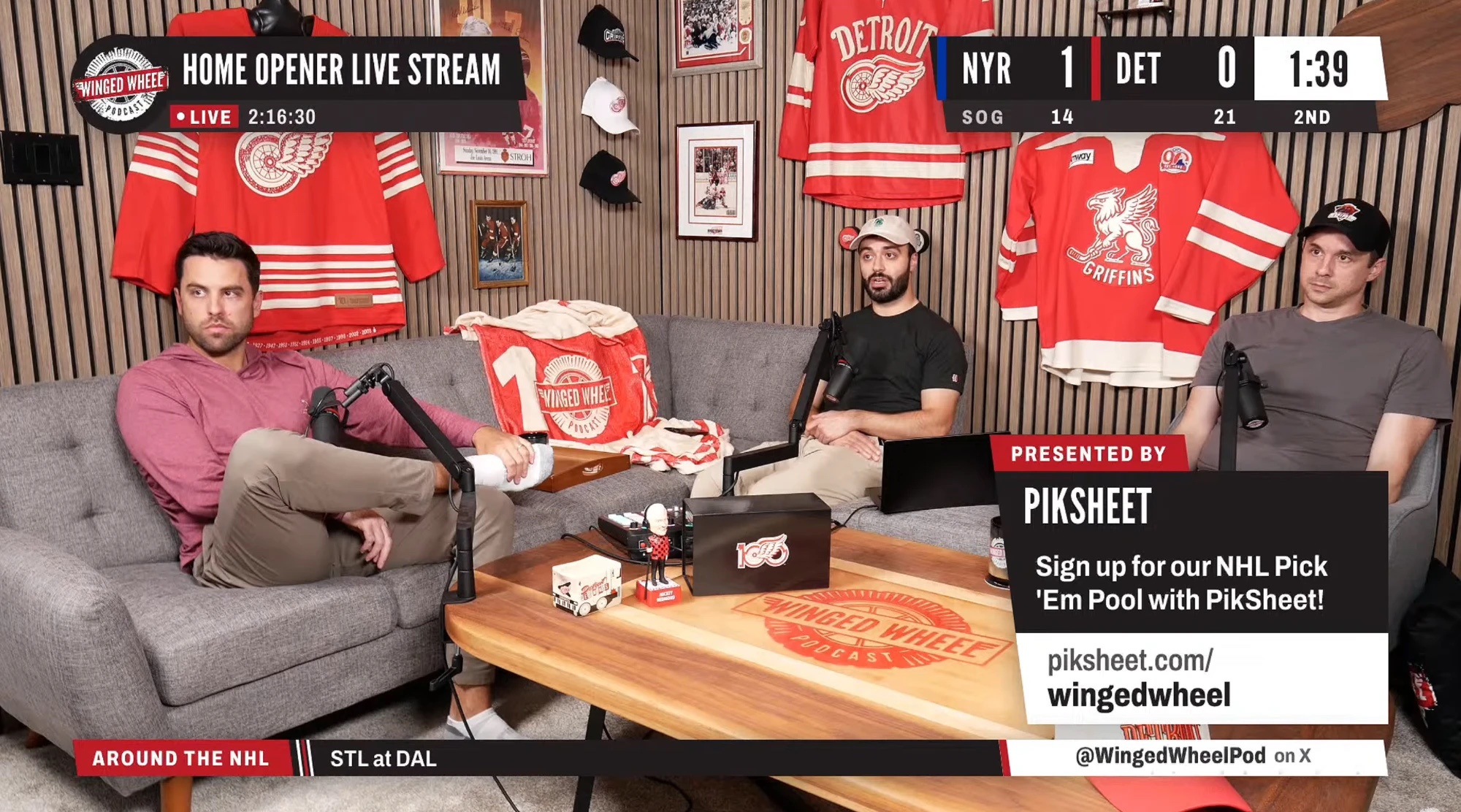 A frame from our Home Opener live stream in the WWP studio, with the hosts on the couch, a game score at the top and an on-screen sponsor card in the lower right.